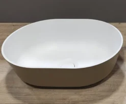 Bänkskivemonterat halvovalt tvättställ i Ocritech vit/beige 350x260 mm